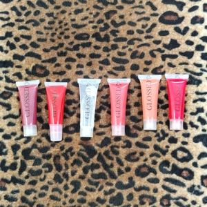 Lipglosses nude, pink and red